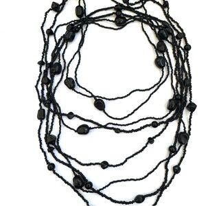 Four 1996 Vintage Beaded Necklaces. Strands of Black Beads in Various Lengths.